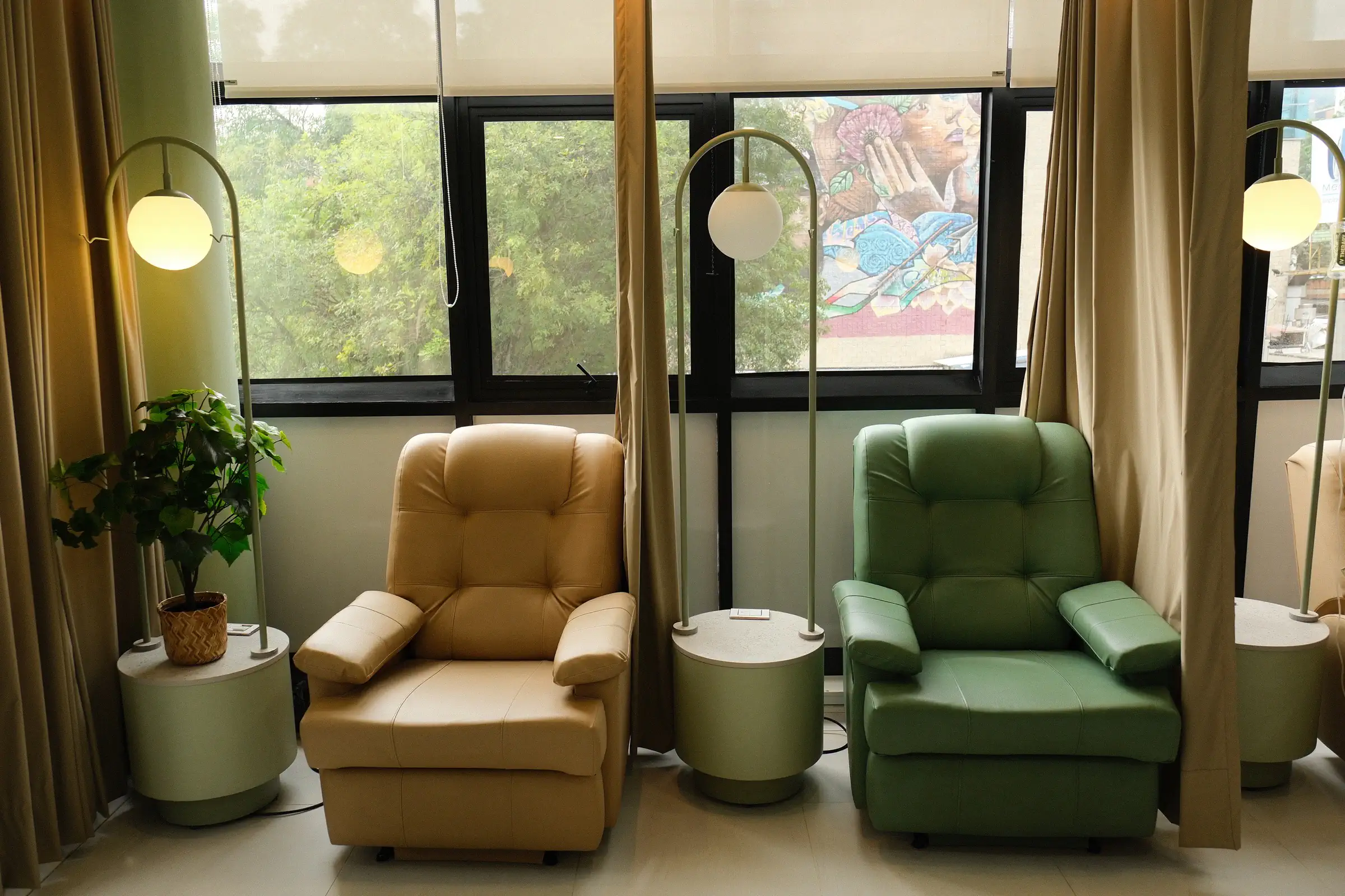 Wide view of the lounge with seating and natural light