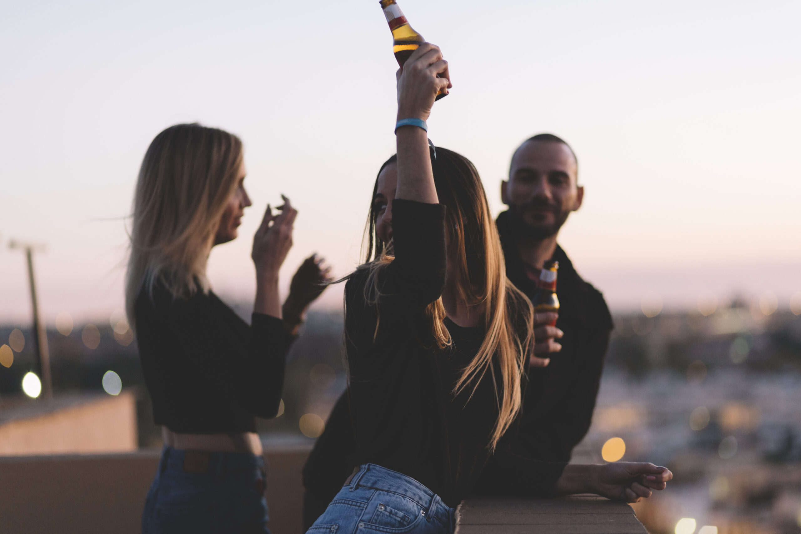 friends-drinking-beer-roof